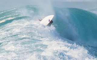 How do big wave surfers catch their waves?