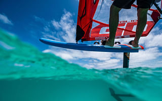 Is surfing easier to learn than windsurfing?